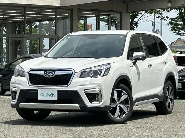 スバル フォレスター ハイブリッド アドバンス 宮城県 2019(令1)年 1.8万km クリスタルホワイトP ワンオーナー/純正ナビ/TV(フルセグ)/AM・FM/Bluetooth/CD・DVD/USB/WiFi/SD/ドラレコ前/パワーシートDN/ユーティリティフック/デジタルインナーミラー/パドルシフト/車外カメラF/S/B/X MODE/アイサイト/プリクラッシュブレーキ/AVH/車線維持/車線逸脱警報/後側方警戒支援システム/ステアリング連動ヘッドランプ/レーダークルーズコントロール/スリップ表示灯/横滑り防止