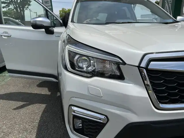 スバル フォレスター ハイブリッド アドバンス 宮城県 2019(令1)年 1.8万km クリスタルホワイトP ワンオーナー/純正ナビ/TV(フルセグ)/AM・FM/Bluetooth/CD・DVD/USB/WiFi/SD/ドラレコ前/パワーシートDN/ユーティリティフック/デジタルインナーミラー/パドルシフト/車外カメラF/S/B/X MODE/アイサイト/プリクラッシュブレーキ/AVH/車線維持/車線逸脱警報/後側方警戒支援システム/ステアリング連動ヘッドランプ/レーダークルーズコントロール/スリップ表示灯/横滑り防止