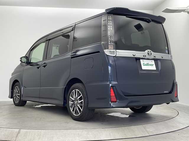 トヨタ ヴォクシー ZS 大阪府 2014(平26)年 6.5万km ブラッキッシュアゲハガラスフレーク フリップダウンモニター/ALPINEナビ　/・バックカメラ/・フルセグテレビ/ＤＶＤ/・AM/FM/BT　/両側電動スライドドア/レーダー探知機　（ＺＥＲＯ８４Ｖ）/ビルトインＥＴＣ　/純正フロアマット　/純正ドアバイザー　/純正１６インチＡＷ
