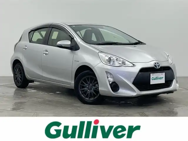 トヨタ アクア L 富山県 2015(平27)年 6.5万km シルバーM 純正ナビ【NSCP-W64】/（AM/FM/CD/SD/AUX/BT）/ワンセグTV/鉄チン付き冬タイヤ積込/横滑り防止装置/ビルトインETC/社外フロアマット/リモコンキー/オートエアコン/ドアバイザー