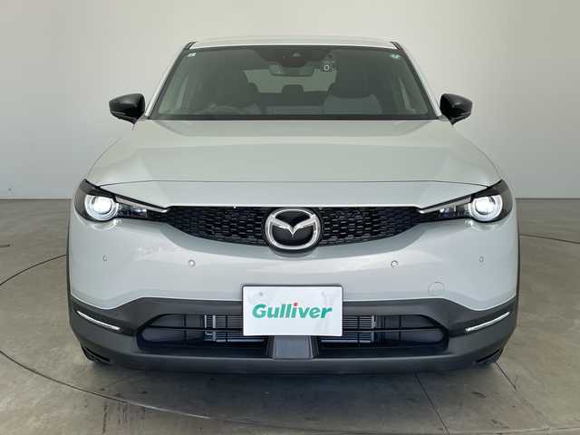 マツダ ＭＸ－３０ 兵庫県 2021(令3)年 2.3万km セラミックM ・純正ナビ/Bluetooth/TV/USB/HDMI/・全方位カメラ/・BOSEサウンド/・スマートブレーキサポート/・スマートブレーキサポート（後進時）/・レーンキープアシストシステム/・車線逸脱警報システム/・前側方接近車両検知/・後側方接近車両検知/・ブラインドスポットモニター/・緊急時車線維持支援/・ドライバーモニタリング/・コーナーセンサー/・ヘッドアップディスプレイ/・ステアリングスイッチ/・パドルシフト/・ステアリングヒーター/・前席シートヒーター/・運転席パワーシート/・社外前後ドライブレコーダー/・LEDヘッドライト/・スマートキー/・純正アルミホイールタイヤ