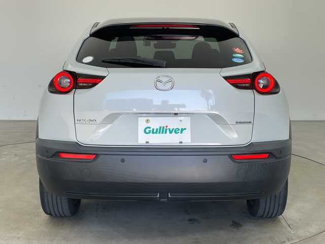 マツダ ＭＸ－３０ 兵庫県 2021(令3)年 2.3万km セラミックM ・純正ナビ/Bluetooth/TV/USB/HDMI/・全方位カメラ/・BOSEサウンド/・スマートブレーキサポート/・スマートブレーキサポート（後進時）/・レーンキープアシストシステム/・車線逸脱警報システム/・前側方接近車両検知/・後側方接近車両検知/・ブラインドスポットモニター/・緊急時車線維持支援/・ドライバーモニタリング/・コーナーセンサー/・ヘッドアップディスプレイ/・ステアリングスイッチ/・パドルシフト/・ステアリングヒーター/・前席シートヒーター/・運転席パワーシート/・社外前後ドライブレコーダー/・LEDヘッドライト/・スマートキー/・純正アルミホイールタイヤ