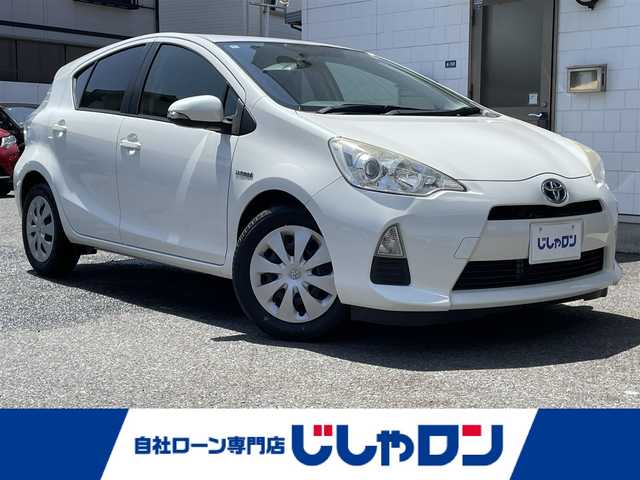 トヨタ アクア S 滋賀県 2012(平24)年 7.6万km ライムホワイトパールクリスタルシャイン (株)IDOMが運営する【じしゃロン草津店】の自社ローン専用車両になりますこちらは現金またはオートローンご利用時の価格です。自社ローンご希望の方は別途その旨お申付け下さい