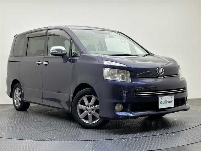 トヨタ ヴォクシー ZS 煌 愛媛県 2009(平21)年 11.4万km ダークバイオレットマイカメタリック ・ナビ（ワンセグＴＶ・ＢＴ・ＣＤ・ＤＶＤ・ＨＤＤ）/・バックカメラ　/・ＥＴＣ　/・前後ドラレコ　/・両側電動ドア　/・プッシュスタート　/・スマートキー　/・スペアキー