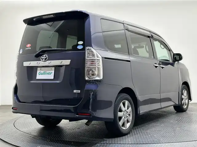 トヨタ ヴォクシー ZS 煌 愛媛県 2009(平21)年 11.4万km ダークバイオレットマイカメタリック ・ナビ（ワンセグＴＶ・ＢＴ・ＣＤ・ＤＶＤ・ＨＤＤ）/・バックカメラ　/・ＥＴＣ　/・前後ドラレコ　/・両側電動ドア　/・プッシュスタート　/・スマートキー　/・スペアキー