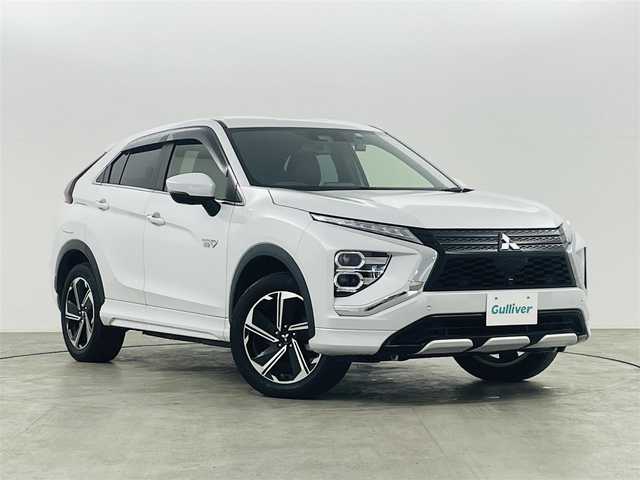 三菱 エクリプス クロス ＰＨＥＶ P 福島県 2021(令3)年 6.8万km ホワイトダイヤモンド eアシスト/・衝突軽減ブレーキ/・車線逸脱警報装置/・ブラインドスポットモニター/・コーナーセンサー/・レーダークルーズコントロール/・ヘッドアップディスプレイ/純正ナビ/・フルセグTV/Bluetooth/USB/・全方位カメラ/・ETC/・ドライブレコーダー/アイドリングストップ/電子パーキング/・オートホールド/革巻きステアリング/・ステアリングリモコン/・パドルシフト/・ステアリングヒーター/パワーシート(運転席)/・シートヒーター(運転席/助手席)/プッシュスタート/・スマートキー/LEDヘッドライト/・オートライト/・フォグライト/電動格納ミラー/純正フロアマット/ドアバイザー