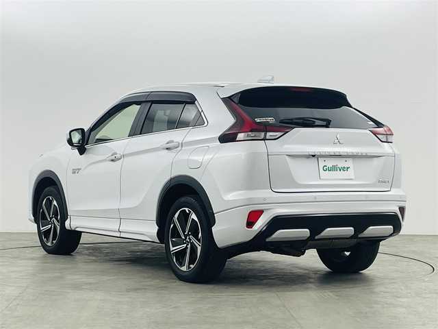 三菱 エクリプス クロス ＰＨＥＶ P 福島県 2021(令3)年 6.8万km ホワイトダイヤモンド eアシスト/・衝突軽減ブレーキ/・車線逸脱警報装置/・ブラインドスポットモニター/・コーナーセンサー/・レーダークルーズコントロール/・ヘッドアップディスプレイ/純正ナビ/・フルセグTV/Bluetooth/USB/・全方位カメラ/・ETC/・ドライブレコーダー/アイドリングストップ/電子パーキング/・オートホールド/革巻きステアリング/・ステアリングリモコン/・パドルシフト/・ステアリングヒーター/パワーシート(運転席)/・シートヒーター(運転席/助手席)/プッシュスタート/・スマートキー/LEDヘッドライト/・オートライト/・フォグライト/電動格納ミラー/純正フロアマット/ドアバイザー