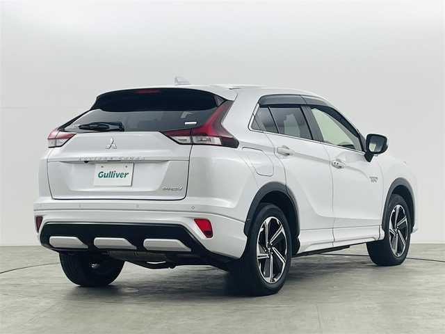 三菱 エクリプス クロス ＰＨＥＶ P 福島県 2021(令3)年 6.8万km ホワイトダイヤモンド eアシスト/・衝突軽減ブレーキ/・車線逸脱警報装置/・ブラインドスポットモニター/・コーナーセンサー/・レーダークルーズコントロール/・ヘッドアップディスプレイ/純正ナビ/・フルセグTV/Bluetooth/USB/・全方位カメラ/・ETC/・ドライブレコーダー/アイドリングストップ/電子パーキング/・オートホールド/革巻きステアリング/・ステアリングリモコン/・パドルシフト/・ステアリングヒーター/パワーシート(運転席)/・シートヒーター(運転席/助手席)/プッシュスタート/・スマートキー/LEDヘッドライト/・オートライト/・フォグライト/電動格納ミラー/純正フロアマット/ドアバイザー