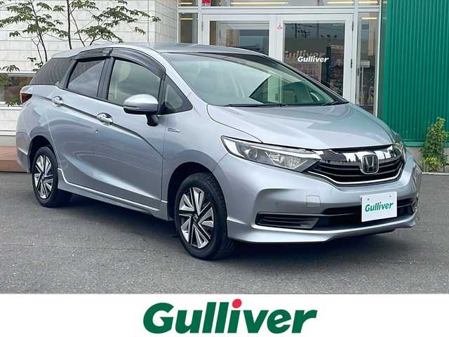 ホンダ シャトル ハイブリッド ホンダセンシング 青森県 2020(令2)年 10.5万km ルナシルバーM 4WD/純正メモリナビ・フルセグTV/バックカメラ/ホンダセンシング/衝突軽減ブレーキ/追従クルーズコントロール/レーンキープアシスト/ビルトインETC/ヒーテッドドアミラー/ワイパーデアイサー/スマートキー/プッシュスタート/純正フロアマット