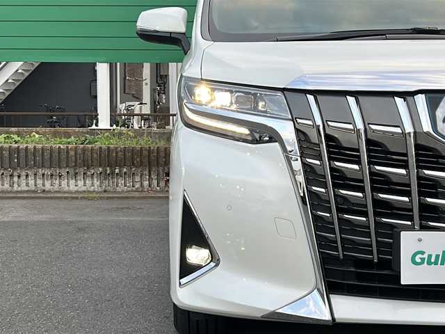 トヨタ アルファードハイブリット エグゼクティブ ラウンジ 茨城県 2020(令2)年 4.3万km ホワイトパールクリスタルシャイン 純正10.5インチナビ/ＪＢＬプレミアムサウンド　/トヨタセーフティーセンス　/パノラマミックビューモニター　/ブラインドスポットモニター　/デジタルインナーミラー/ツインムーンルーフ　/ビルトインＥＴＣ２．０/リアエンターテイメントシステム/４WD/両側パワースライドドア/電動リアゲート/パワーシート/レザーシート/オートライト/オートマチックハイビーム/LEDヘッドライト/シーケンシャルターンランプ/コーナーセンサー前後/純正フロアマット/ステアリングヒーター/シートヒーター　エアシート/パーキングアシスト/衝突軽減システム/横滑り防止装置/AC100V/レーダークルーズコントロール
