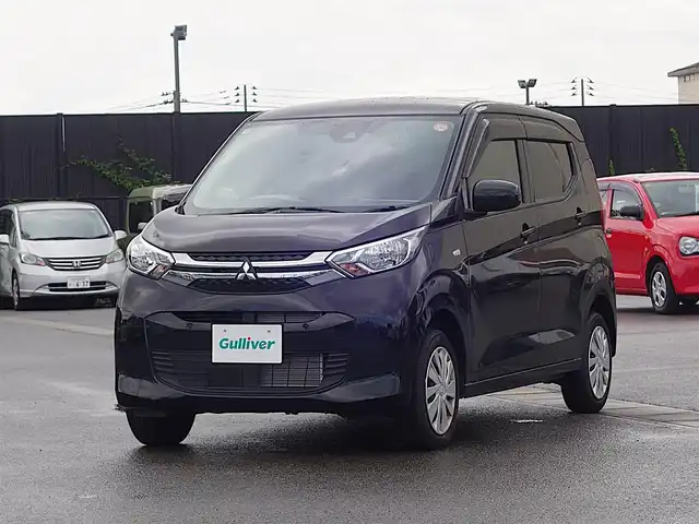 三菱 ｅＫワゴン M 山形県 2024(令6)年 0.8万km アメジストブラック 4WD/衝突被害軽減システム/純正カーオーディオ/　　【CD USB AUX AM/FM】/バックカメラ/オートライト/シートヒーター/アイドリングストップ/コーナーセンサー/ステアリングスイッチ/スマートルームミラー/電動格納ミラー/純正フロアマット/ドアバイザ―/リモコンキー/スペアキー