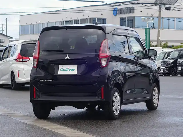 三菱 ｅＫワゴン M 山形県 2024(令6)年 0.8万km アメジストブラック 4WD/衝突被害軽減システム/純正カーオーディオ/　　【CD USB AUX AM/FM】/バックカメラ/オートライト/シートヒーター/アイドリングストップ/コーナーセンサー/ステアリングスイッチ/スマートルームミラー/電動格納ミラー/純正フロアマット/ドアバイザ―/リモコンキー/スペアキー
