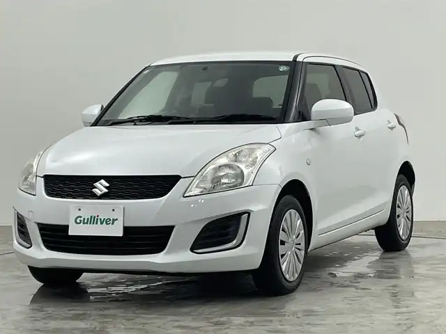 スズキ スイフト XG 群馬県 2015(平27)年 6万km スノーホワイトパール ４ＷＤ　社外オーディオ　シートヒーター　純正１５インチホイール　ＥＴＣ　スマートキー　スペアキー　横滑り防止装置　盗難防止装置　ＡＢＳ　オートエアコン　パワーウィンドウ　パワーステアリング　禁煙車