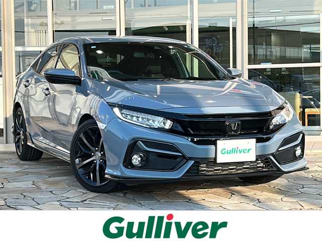 ホンダ シビック ハッチバック 静岡県 2020(令2)年 1.5万km ソニックグレーパール ナビ/・ラジオ/フルセグTV/・USB/HDMI/AUX/CD/DVD/Bluetooth/主要装備/・ドライブレコーダー　/・ＥＴＣ２．０　/・バックカメラ　/・ＬＥＤヘッドライト　/・パワーシート　/・レーダークルーズコントロール　/・スマートキー　/・ステアリングリモコン　/・ハーフレザーシート　/・ヒーテッドドアミラー　/・純正アルミホイール/・ホールド/・シートヒーター/・レーンキープアシスト/・オートライト/・オートハイビーム/・プッシュスタート