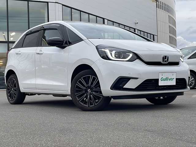 ホンダ フィット e:HEVホーム カーサ 青森県 2021(令3)年 3.1万km プラチナホワイトパール ・4WD/・寒冷地仕様/・コンフォートビューパッケージ/・純正ギャザーズナビ/・Bluetooth/・フルセグTV/・バックカメラ/・衝突軽減ブレーキ/・レーンキープアシスト/・レーダークルーズコントロール/・ドライブレコーダー/・コーナーセンサー/・ワイパーデアイサ/・オートマチックハイビーム/・シートヒーター/・スマートキー/・スペアキーあり/・USB端子/・ETC/・純正LEDヘッドライト/・純正16AW