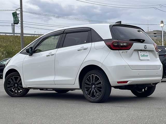 ホンダ フィット e:HEVホーム カーサ 青森県 2021(令3)年 3.1万km プラチナホワイトパール ・4WD/・寒冷地仕様/・コンフォートビューパッケージ/・純正ギャザーズナビ/・Bluetooth/・フルセグTV/・バックカメラ/・衝突軽減ブレーキ/・レーンキープアシスト/・レーダークルーズコントロール/・ドライブレコーダー/・コーナーセンサー/・ワイパーデアイサ/・オートマチックハイビーム/・シートヒーター/・スマートキー/・スペアキーあり/・USB端子/・ETC/・純正LEDヘッドライト/・純正16AW