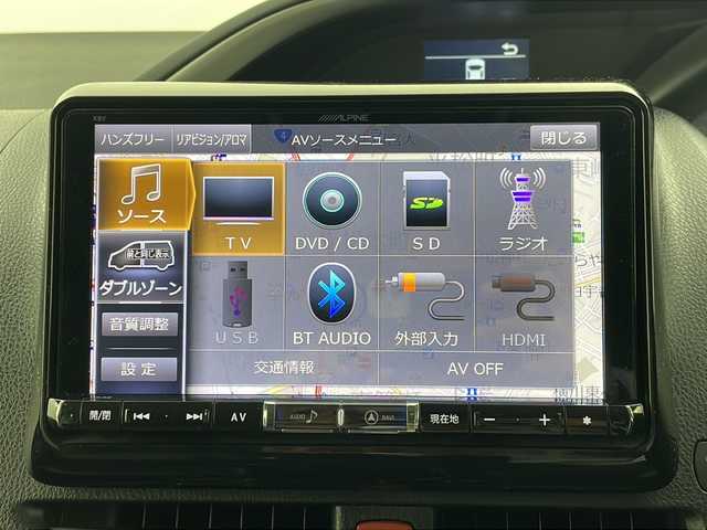 トヨタ ヴォクシー ZS 煌Ⅱ 栃木県 2016(平28)年 8.3万km ホワイトパールクリスタルシャイン アルパイン9型ナビ/　　CD/DVD/Bluetooth/AM/FM/フルセグTV/バックカメラ/ビルトインETC/トヨタセーフティセンス/・プリクラッシュセーフティ/・レーンデパーチャーアラート/・オートマチックハイビーム/12.8型フリップダウンモニター/両側パワースライドドア/純正15インチAW/純正フロアマット/純正ドアバイザー/革調シートカバー/オートライト/LEDヘッドライト/LEDフォグ/プッシュスタート/スマートキー