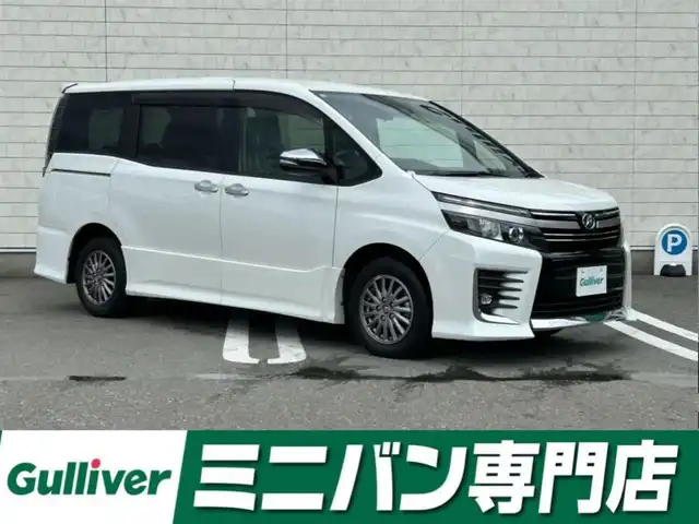 トヨタ ヴォクシー ZS 煌Ⅱ 福岡県 2016(平28)年 8.3万km ホワイトパールクリスタルシャイン アルパイン9型ナビ【フルセグTV/CD/DVD/Bluetooth】 バックカメラ ビルトインETC トヨタセーフティセンス  オートマチックハイビーム フリップダウンモニター 両側パワースライドドア 純正15インチAW 純正フロアマット オートライト LEDヘッドライト LEDフォグ プッシュスタート スマートキー