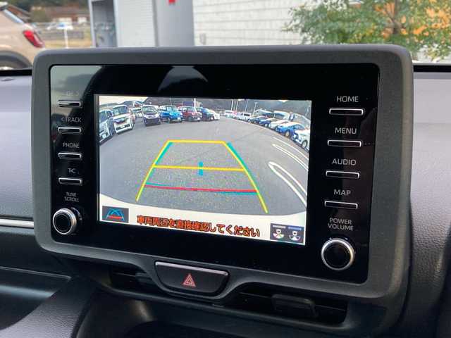 トヨタ ヤリス ハイブリッド X 愛媛県 2022(令4)年 6.3万km スーパーホワイトⅡ 純正ディスプレイオーディオ/・ナビキット/・Bluetooth/バックカメラ/トヨタセーフティセンス/追従クルーズコントロール/ステアリングスイッチ/ＬＥＤヘッドライト/オートライト/オートハイビーム/ＡＣ１００Ｖ/スマートキー/スペアキー/電格ミラー/取扱説明書/保証書