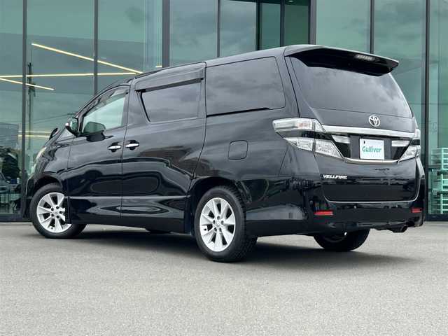 トヨタ ヴェルファイア 2．4Z 東京都 2012(平24)年 13.6万km ブラック Alpine8型ナビTV/CD/DVD/Bluetooth/フルセグTV/バックカメラ/Alpine製フリップダウンモニター/純正17インチアルミ/クルーズコントロール/ビルトインETC/2列目オットマン/純正キセノンオートライト/キャプテンシート/純正フォグ/フロアマット/両側電動スライドドア/クリアランスソナー/コーナーセンサー/カーテンエアバッグ/MTモード付AT/本革巻ハンドル/ウッド調パネル/ウインカードアミラー/Wオートエアコン（ナノイー）/スマートキー/プッシュエンジンスタート
