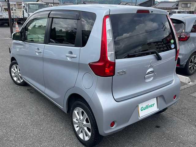 三菱 ｅＫワゴン G 滋賀県 2014(平26)年 10.9万km クールシルバーメタリック 純正14インチアルミホイール/ケンウッドナビゲーション（MDV-D406BTW）/・ワンセグTV/・CD/DVD/・Bluetooth/バックカメラ/プッシュスタート/アイドリングストップ/コーナーポール（手動伸縮式）/スペアキー