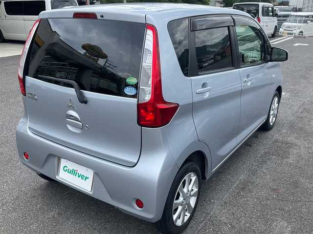 三菱 ｅＫワゴン G 滋賀県 2014(平26)年 10.9万km クールシルバーメタリック 純正14インチアルミホイール/ケンウッドナビゲーション（MDV-D406BTW）/・ワンセグTV/・CD/DVD/・Bluetooth/バックカメラ/プッシュスタート/アイドリングストップ/コーナーポール（手動伸縮式）/スペアキー