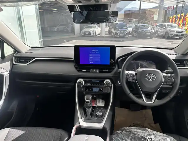 トヨタ ＲＡＶ４ G Zパッケージ 京都府 2025(令7)年 0.1千km プラチナホワイトパールマイカ トヨタセーフティセンス/・プリクラッシュセーフティ/・レーダークルーズコントロール/・レーントレーシングアシストポート/・オートマチックハイビーム/・低速時加速抑制機能/・緊急時操舵支援/・横断歩行者検知機能/・カーブ速度抑制機能/純正10.5インチメモリーナビ、地デジ、Bluetooth/パノラミックビューモニター/パノラマムーンルーフ/運転席パワーシート/シートポジションメモリー/合皮黒革シート（エアーシート、シートヒーター）/デジタルインナーミラー/ハンドルヒーター/パワーバックドア/LEDヘッドランプ/USB端子/ビルトイン2.0ETC