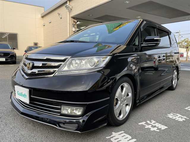 ホンダ エリシオン プレステージ S HDDナビ SP 和歌山県 2009(平21)年 9.3万km プレミアムブラキッシュパール 純正HDDインターナビ・CD・DVD/バックカメラ/社外フリップダウンモニター/社外フロント・リアスポイラー/社外車高調/社外マフラー/社外フォグランプ/HIDヘッドライト/ウッドコンビステアリング/ハーフレザーシート/社外リアシーケンシャルウィンカー/キーレス/スペアキー/保証書/取扱説明書
