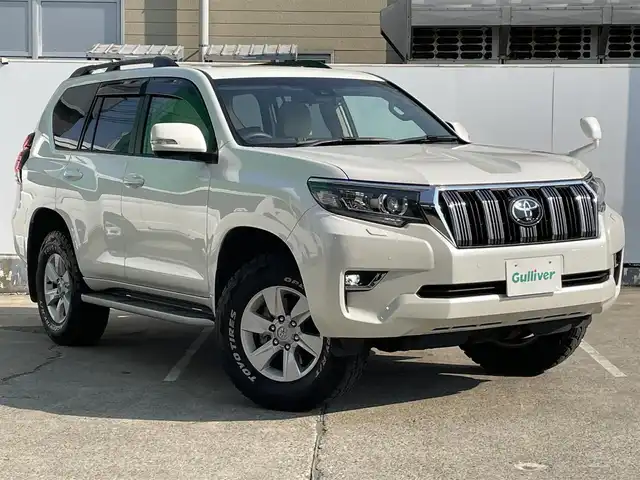 トヨタ ランドクルーザー プラド TX 青森県 2023(令5)年 1.7万km ホワイトパールクリスタルシャイン 4WD/ワンオーナー/トヨタセーフティーセンス/・プリクラッシュ/・レーンキープアシスト/・追従クルーズコントロール/・オートマチックハイビーム/・ロードサインアシスト/社外ディスプレイオーディオ/[AM/FM/DVD/CD/USB/BT/AUX]/バックカメラ/社外ドライブレコーダー/フォグランプ/ハーフレザー/シートヒーター/ETC/サンルーフ/コーナーセンサー/エアバッグダブル＋カーテンエアバッグ/純正アルミホイール/ステアリングスイッチ/横滑り防止機能/シガーソケット/スタッドレスタイヤ積み込み/取扱説明書