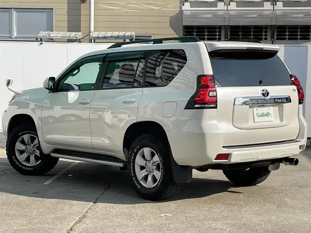 トヨタ ランドクルーザー プラド TX 青森県 2023(令5)年 1.7万km ホワイトパールクリスタルシャイン 4WD/ワンオーナー/トヨタセーフティーセンス/・プリクラッシュ/・レーンキープアシスト/・追従クルーズコントロール/・オートマチックハイビーム/・ロードサインアシスト/社外ディスプレイオーディオ/[AM/FM/DVD/CD/USB/BT/AUX]/バックカメラ/社外ドライブレコーダー/フォグランプ/ハーフレザー/シートヒーター/ETC/サンルーフ/コーナーセンサー/エアバッグダブル＋カーテンエアバッグ/純正アルミホイール/ステアリングスイッチ/横滑り防止機能/シガーソケット/スタッドレスタイヤ積み込み/取扱説明書
