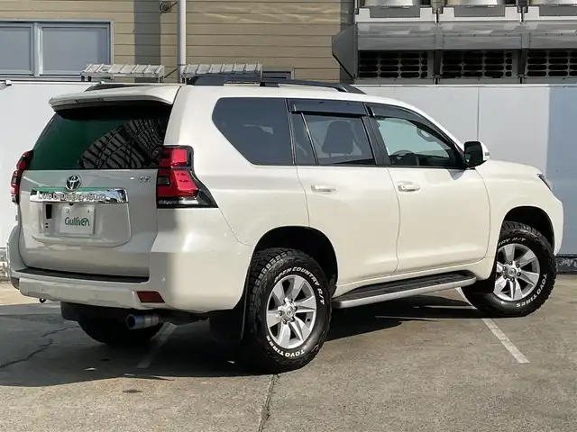 トヨタ ランドクルーザー プラド TX 青森県 2023(令5)年 1.7万km ホワイトパールクリスタルシャイン 4WD/ワンオーナー/トヨタセーフティーセンス/・プリクラッシュ/・レーンキープアシスト/・追従クルーズコントロール/・オートマチックハイビーム/・ロードサインアシスト/社外ディスプレイオーディオ/[AM/FM/DVD/CD/USB/BT/AUX]/バックカメラ/社外ドライブレコーダー/フォグランプ/ハーフレザー/シートヒーター/ETC/サンルーフ/コーナーセンサー/エアバッグダブル＋カーテンエアバッグ/純正アルミホイール/ステアリングスイッチ/横滑り防止機能/シガーソケット/スタッドレスタイヤ積み込み/取扱説明書
