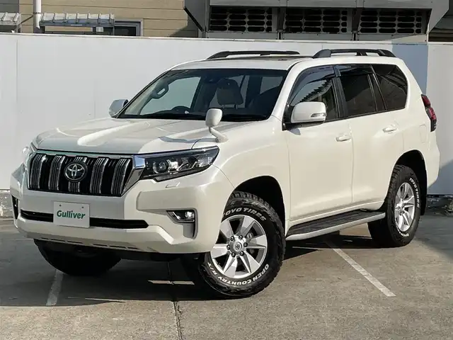 トヨタ ランドクルーザー プラド TX 青森県 2023(令5)年 1.7万km ホワイトパールクリスタルシャイン 4WD/ワンオーナー/トヨタセーフティーセンス/・プリクラッシュ/・レーンキープアシスト/・追従クルーズコントロール/・オートマチックハイビーム/・ロードサインアシスト/社外ディスプレイオーディオ/[AM/FM/DVD/CD/USB/BT/AUX]/バックカメラ/社外ドライブレコーダー/フォグランプ/ハーフレザー/シートヒーター/ETC/サンルーフ/コーナーセンサー/エアバッグダブル＋カーテンエアバッグ/純正アルミホイール/ステアリングスイッチ/横滑り防止機能/シガーソケット/スタッドレスタイヤ積み込み/取扱説明書