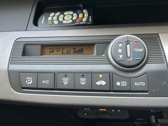 ホンダ フリード ハイブリット ジャストセレクション 福島県 2014(平26)年 10.6万km プレミアムスパークルブラックパール 105512km/社外SDナビ/（BT接続/フルセグTV/DVD/CD/AM/FM）/社外フリップダウンモニター/クルーズコントロール/両側パワースライドドア/ETC/純正フロアマット/社外AW/社外AWスタッドレスタイヤ４本車載/電格ミラー/ウィンカーミラー/HIDヘッドライト/三列シート/ダブルエアバック/横滑り防止装置/保証書/取扱説明書