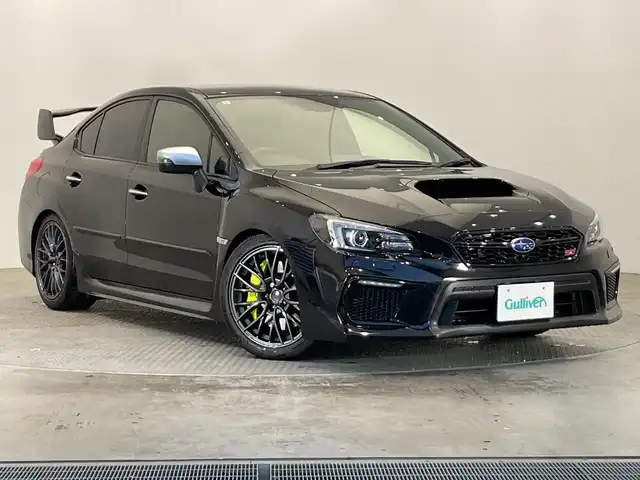 スバル ＷＲＸ ＳＴＩ STI 栃木県 2017(平29)年 2.1万km クリスタルブラックシリカ 4WD/ターボ/社外ナビ(AVIC-RL802)/(フルセグTV・Bluetooth・SD・CD・DVD)/バック・フロント・サイドカメラ/STiイエローキャリパー/車高調/四本出しマフラー/アイサイト/・衝突軽減システム/・レーンキープアシスト/・前後コーナーセンサー/ブラインドスポットモニター/オービスレーダー/前後ドライブレコーダー/ETC/ハーフレザーシート/前席シートヒーター/純正ラバーフロアマット/取扱説明書/保証書