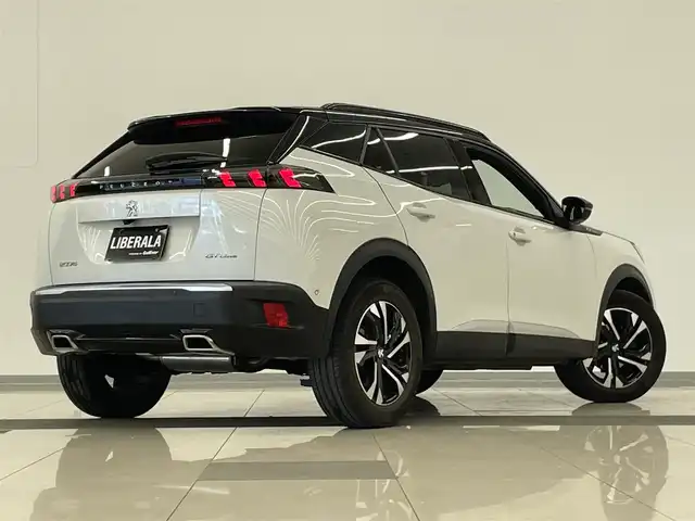 プジョー ２００８ GTライン 岡山県 2020(令2)年 3.2万km ネイクルホワイト 純正ディスプレイオーディオ/・Ｂｌｕｅｔｏｏｔｈ/・アップルカープレイ/・アンドロイドオート/ハンズフリーアクセス/バックカメラ/アンビエンスライト/コーナーセンサー/ＡＣＣ/ワイヤレスチャージ/ディレクショナルヘッドライト/インテリジェントハイビーム/アクティブセーフティーブレーキ/トラフィックサインインフォメーション/ブラインドスポットアシスト/疲労検知システム