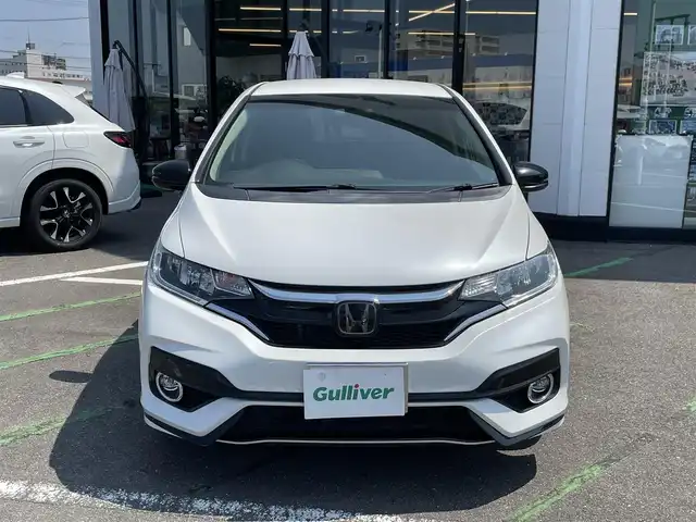 ホンダ フィット 13G S ホンダセンシング 長崎県 2019(令1)年 3.6万km プラチナホワイトパール ワンオーナー/純正ナビ/（SD/BT/USB/CD）/純正ドライブレコーダー/ホンダセンシング/アイドリングストップ/ビルトインETC/オートライト/LEDヘッドライト/パドルシフト/ステアリングスイッチ/レーンキープアシスト/レーダークルーズコントロール/スマートキー/スペアキー/純正フロアマット
