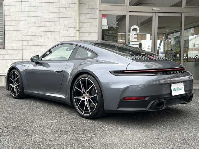 ポルシェ ポルシェ ９１１ カレラT 埼玉県 2025(令7)年 0.4万km グレーＭ ワンオーナー/黒レザーインテリア/バナジウムグレーメタリック/マトリクスLEDヘッドライト/アダプティブスポーツシートプラス（18way電動調節、メモリーパッケージ付）/前席シートベンチレーション/ExclusiveDesignフューエルキャップ/純正ディスプレイオーディオ/ナビ/BT/FM/全周囲カメラ　/バックカメラ/前後ドライブレコーダー　/ビルトインＥＴＣ　/前席シートヒーター　/前席エアーシート　/前席パワーシート/運転席メモリーシート/オートハイビーム/オートライト/ＡＣＣ/衝突軽減システム　/ＢＳＭ　/高速道路ライトシステム/疲労軽減システム/ポルシェ２Ｘ危険警告/湿気検知システム/後退車両検知警告/退出警告/横滑り防止/置くだけ充電/スマートキー　/デコラティブサイドロゴ/純正アルミホイール（ハイグロスブラック塗装、ハイポリッシュ仕上げ）/LHD仕様/保証書　/取扱説明書