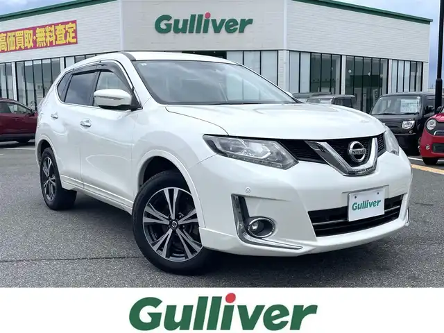 日産 エクストレイル モード・プレミア 鳥取県 2017(平29)年 6.4万km ブリリアントホワイトパール 特別仕様車　モードプレミア/・専用フルカラードエクステリア/・専用ハイコントラストレザーインテリア/・専用フロントバンパー/・専用ヂュアルエキゾーストマフラー/純正ナビ／ＴＶ／ＣＤ／ＢＴ/バックカメラ/ドライブレコーダー/エマージェンシーブレーキ/ＬＥＤヘットライト/前席シートヒーター/プッシュスタート/フォグライト/４WD切替スイッチ/純正１８インチアルミホイール/アイドリングストップ/ウィンカーミラー/フロアマット/ドアバイザー
