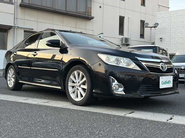 トヨタ カムリ ハイブリット Gパッケージ 岡山県 2012(平24)年 11.5万km アティチュードブラックマイカ 登録時走行距離114406キロ/純正SDナビ（NSZT-W62G）/AM/FM/Bluetooth/CD/DVD/SD/バックカメラ/運転席パワーシート/純正17インチAW/純正フロアマット/電動格納ミラー/HIDヘッドライト/スマートキー/プッシュスタート/ビルトインETC
