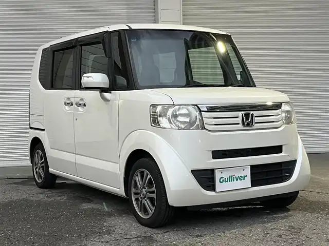 ホンダ Ｎ ＢＯＸ G SSパッケージ 高知県 2013(平25)年 9.7万km プレミアムホワイトパール 社外CD・DVDプレイヤー/バックカメラ/ETC/フルセグテレビ/プッシュスタート/スマートキー/スペアキー/アイドリングストップ/純正フロアマット/純正14インチアルミホイール/両側パワースライドドア/チップアップシート/ベンチシート/横滑り防止装置/盗難防止装置/保証書/記録簿/取扱説明書