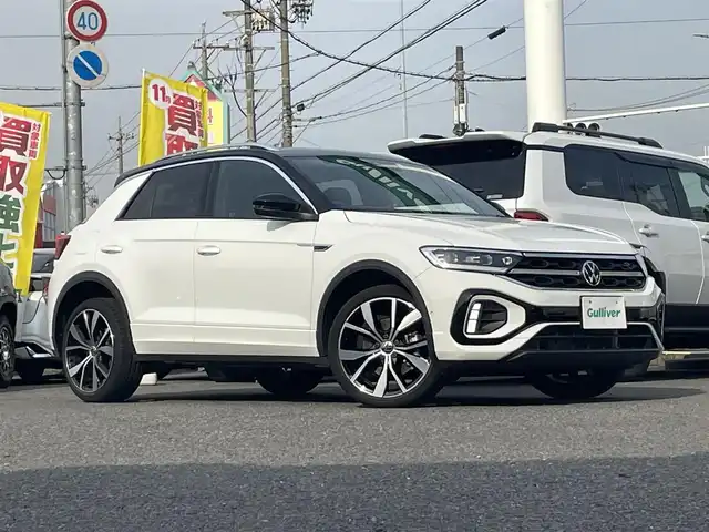 フォルクスワーゲン ＶＷ Ｔ－ロック TDI Rライン 愛知県 2023(令5)年 1.6万km ピュアホワイト /禁煙車//メーカーナビ//BT/AM/FM/Apple Car Play//バックカメラ//ビルトインETC2.0//iQ.DRIVE(Front Assist/Lane Assist/Side Assist/疲労検知システム/プロアクティブ・オキュパント・プロテクション/カーテンエアバッグ/W+サイドエアバッグ/オートハイビーム)//IQ.LIGHTライト//スペアスマートキー//前後方ドライブレコーダー//USB-C//ルーフレール//パワーシート//純正フロアマット//純正19インチアルミホイール//オートLEDヘッドライト//フォグランプ//ステアリングスイッチ//パドルシフト//AAC//おくだけ充電//シートヒーター//電動パーキングブレーキ//アクティブパーキングアシスト//オートホールドブレーキ//ブラインドスポットモニター//オートリトラウィンカーミラー//ヒーテッドドアミラー//リヤシーケンシャルウィンカー//クリアランスソナー//スペアタイヤ//ディーラー記録簿(R7.1)//保証書//取扱説明書