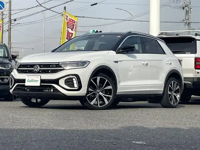 フォルクスワーゲン ＶＷ Ｔ－ロック TDI Rライン 愛知県 2023(令5)年 1.6万km ピュアホワイト /禁煙車//メーカーナビ//BT/AM/FM/Apple Car Play//バックカメラ//ビルトインETC2.0//iQ.DRIVE(Front Assist/Lane Assist/Side Assist/疲労検知システム/プロアクティブ・オキュパント・プロテクション/カーテンエアバッグ/W+サイドエアバッグ/オートハイビーム)//IQ.LIGHTライト//スペアスマートキー//前後方ドライブレコーダー//USB-C//ルーフレール//パワーシート//純正フロアマット//純正19インチアルミホイール//オートLEDヘッドライト//フォグランプ//ステアリングスイッチ//パドルシフト//AAC//おくだけ充電//シートヒーター//電動パーキングブレーキ//アクティブパーキングアシスト//オートホールドブレーキ//ブラインドスポットモニター//オートリトラウィンカーミラー//ヒーテッドドアミラー//リヤシーケンシャルウィンカー//クリアランスソナー//スペアタイヤ//ディーラー記録簿(R7.1)//保証書//取扱説明書