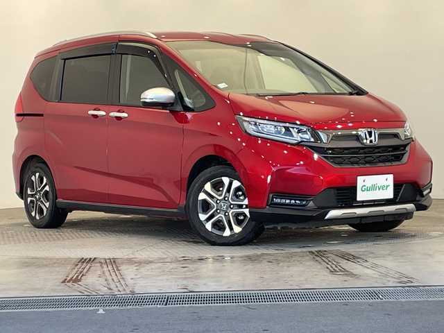 ホンダ フリード ハイブリット クロスター 栃木県 2022(令4)年 2.5万km プレミアムクリスタルレッドM ワンオーナー/純正9インチプレミアムインターナビ/（CD/DVD/フルセグTV/Bluetooth/USB/SD/iPod）/バックカメラ/ホンダセンシング/ビルトインETC/純正前後ドライブレコーダー/両側パワースライドドア/ハーフレザーシート/前席シートヒーター/禁煙車/ルーフレール/オートライト/LEDヘッドライト/横滑り防止装置/スマートキー/プッシュスタート/ステアリングスイッチ/革巻きステアリング/ウィンカーミラー/純正15インチアルミホイール/純正フロアマット