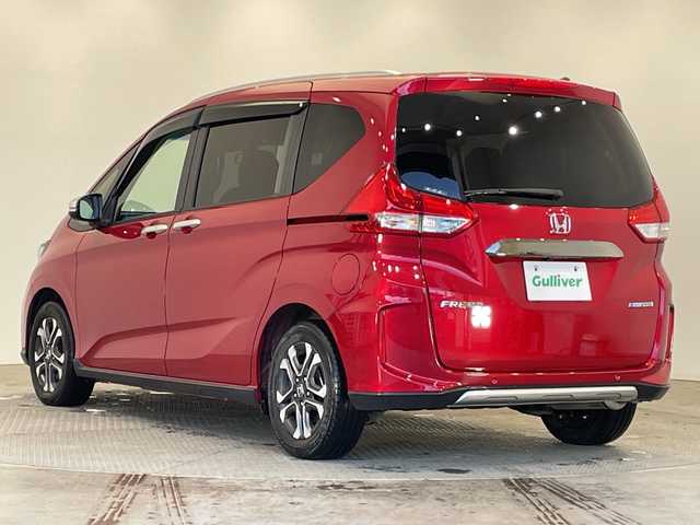 ホンダ フリード ハイブリット クロスター 栃木県 2022(令4)年 2.5万km プレミアムクリスタルレッドM ワンオーナー/純正9インチプレミアムインターナビ/（CD/DVD/フルセグTV/Bluetooth/USB/SD/iPod）/バックカメラ/ホンダセンシング/ビルトインETC/純正前後ドライブレコーダー/両側パワースライドドア/ハーフレザーシート/前席シートヒーター/禁煙車/ルーフレール/オートライト/LEDヘッドライト/横滑り防止装置/スマートキー/プッシュスタート/ステアリングスイッチ/革巻きステアリング/ウィンカーミラー/純正15インチアルミホイール/純正フロアマット