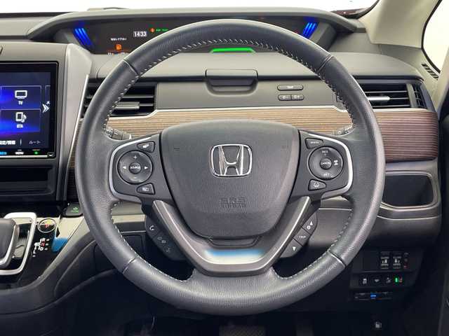 ホンダ フリード ハイブリット クロスター 栃木県 2022(令4)年 2.5万km プレミアムクリスタルレッドM ワンオーナー/純正9インチプレミアムインターナビ/（CD/DVD/フルセグTV/Bluetooth/USB/SD/iPod）/バックカメラ/ホンダセンシング/ビルトインETC/純正前後ドライブレコーダー/両側パワースライドドア/ハーフレザーシート/前席シートヒーター/禁煙車/ルーフレール/オートライト/LEDヘッドライト/横滑り防止装置/スマートキー/プッシュスタート/ステアリングスイッチ/革巻きステアリング/ウィンカーミラー/純正15インチアルミホイール/純正フロアマット