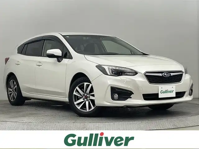 スバル インプレッサ スポーツ 2．0i－L アイサイト 道央・札幌 2019(令1)年 4.4万km クリスタルホワイトP ・４WD/・寒冷地仕様/・純正メモリナビ/・CD/DVD/SD/BT/フルセグ/・バックカメラ/サイドカメラ/・ドライブレコーダー/・アイサイト/・レーンキープアシスト/・アダプティブクルーズコントロール/・コーナーセンサー/・横滑り防止装置/・ブラインドスポットモニター/・アイドリングストップ/・パドルシフト/・LEDヘッドライト/・オートライト/・純正16インチAW/・社外フロアマット/・プッシュスタート/・スマートキー/・保証書/・取扱説明書