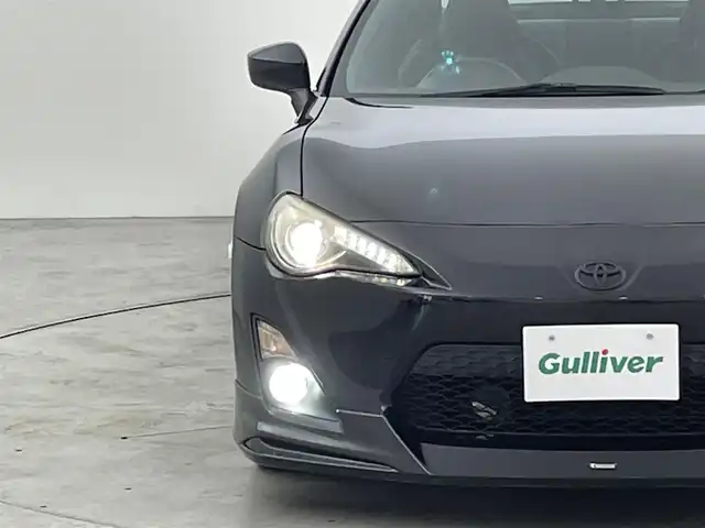 トヨタ ８６ GT リミテッド 福岡県 2012(平24)年 13.9万km クリスタルブラックシリカ モデリスタエアロ　/純正ナビ（フルセグＴＶ）　/バックカメラ　/ＥＴＣ　/パドルシフト　/ＭＴモード付　/シートヒーター　/ハーフレザーシート　/革巻きステアリング　/社外リアウィング　/純正１７インチＡＷ　/ＬＥＤライト