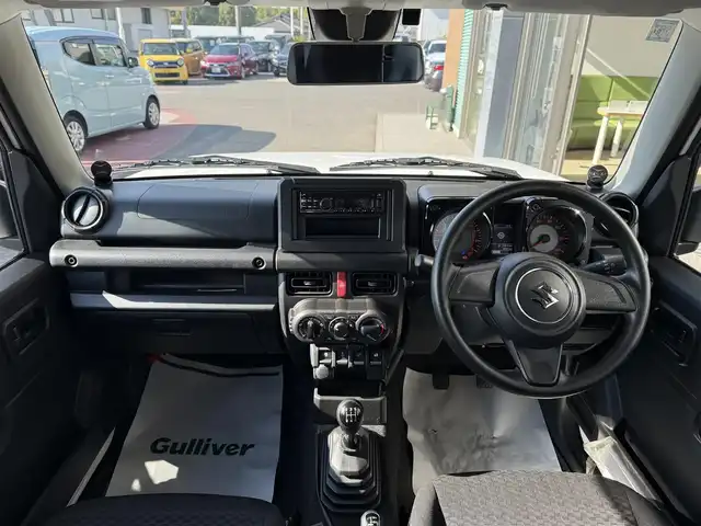 スズキ ジムニー XG 香川県 2019(平31)年 1万km スペリアホワイト ターボ/パートタイム4WD/CDデッキ/ダウンヒルアシストコントロール/LEDヘッドランプ/社外スピーカー/社外ウーハー/リモコンキー/スペアキー/ETC/背面タイヤ/純正フロアマット/フルフラットシート