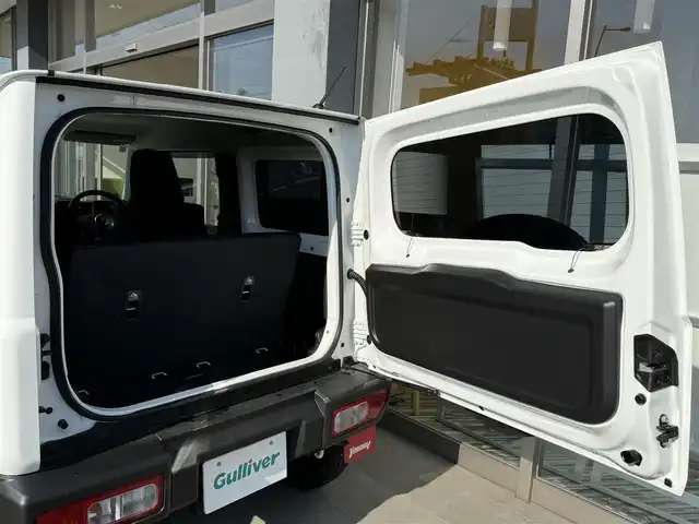 スズキ ジムニー XG 香川県 2019(平31)年 1万km スペリアホワイト ターボ/パートタイム4WD/CDデッキ/ダウンヒルアシストコントロール/LEDヘッドランプ/社外スピーカー/社外ウーハー/リモコンキー/スペアキー/ETC/背面タイヤ/純正フロアマット/フルフラットシート