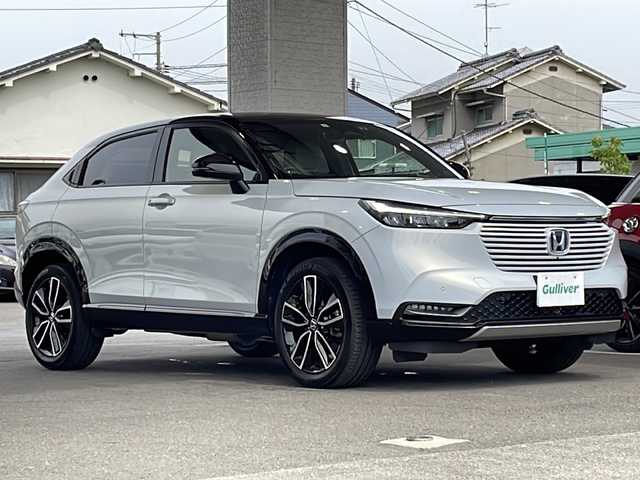 ホンダ ヴェゼル ハイブリッド e:HEV PLaY 愛媛県 2023(令5)年 3万km プレミアムサンライトホワイトパール ワンオーナー/純正ナビ/・フルセグ/BT/全方位カメラ/ビルトインETC/ガラスルーフ/ホンダセンシング /レーダークルーズコントロール/ハーフレザーシート/シートヒーター/ステアリングヒーター/パワーバックドア/ドライブレコーダー/置くだけ充電/BSM/パドルシフト/スマートキー/プッシュスタート/スペアキー